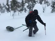 Climbing in the deep snow on the hillside of Riisitunturi National Park (Finland) (Photo by Bruno Klein)-2