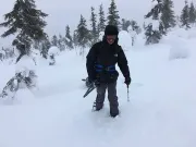 Climbing in the deep snow on the hillside of Riisitunturi National Park (Finland) (Photo by Bruno Klein)