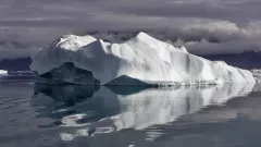 GRO0822_0979_Iceberg reflecting in still waters (Eastern Greenland)